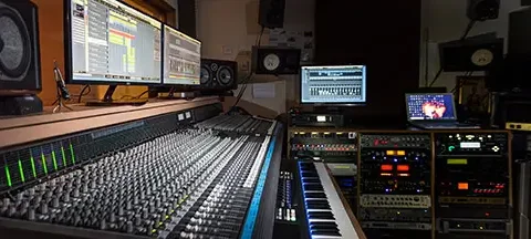 Control room of a professional recording studio in London with mixing desk, monitors and outboard gear