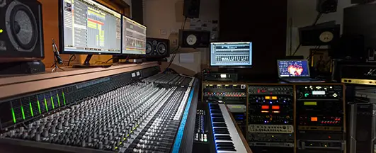 Control room of a professional recording studio in London with mixing desk, monitors and outboard gear